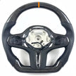 Carbon fiber steering wheel with carbon fiber and orange pinstripe