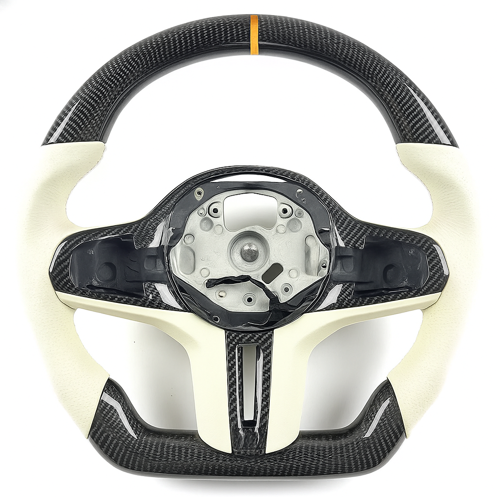 Carbon fiber steering wheel with white accents on a white background